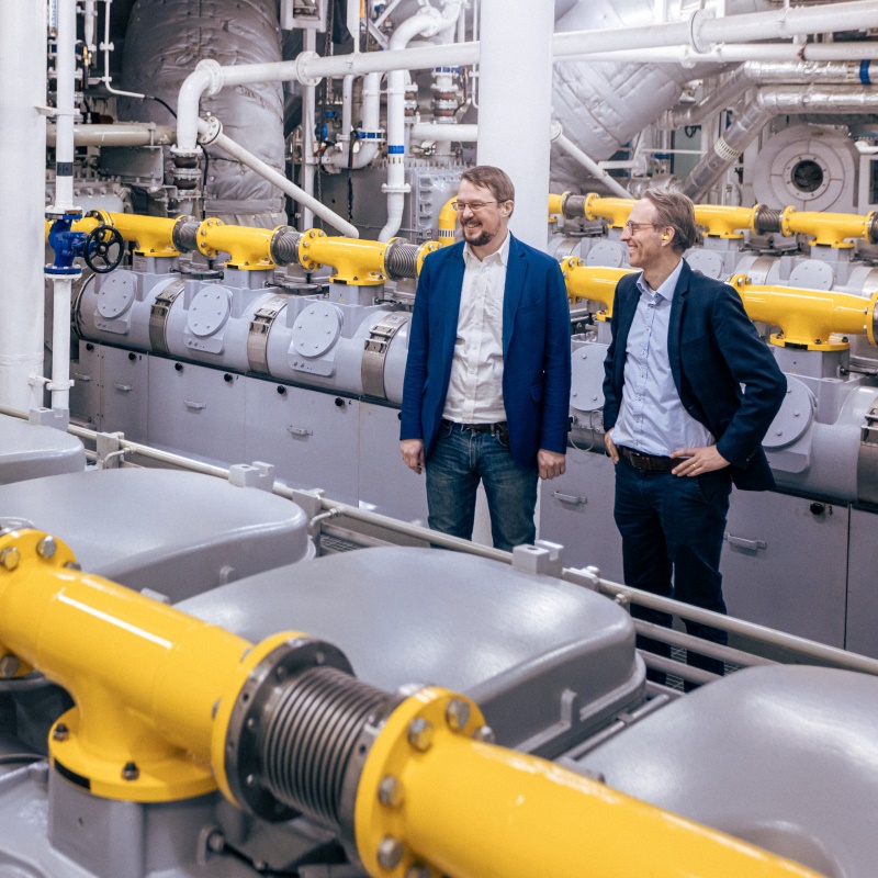 two men in a friendly mood in engine room