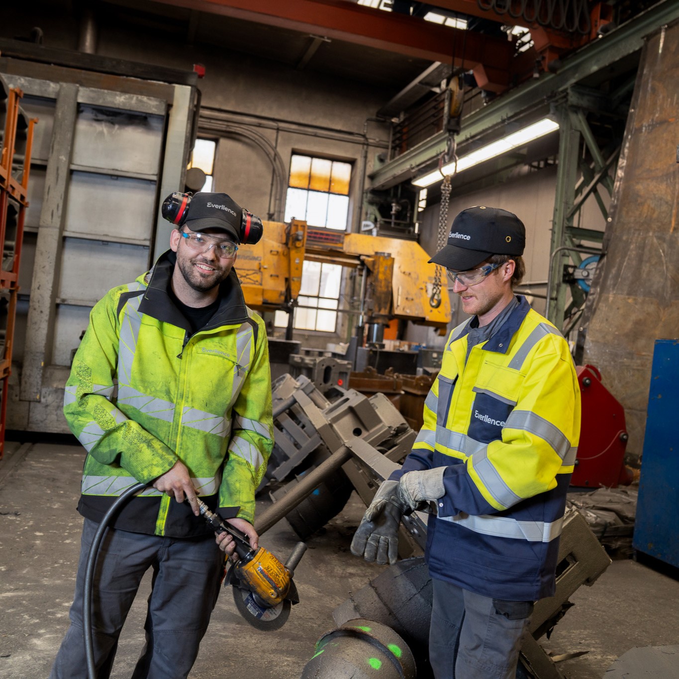 two workers in the foundry