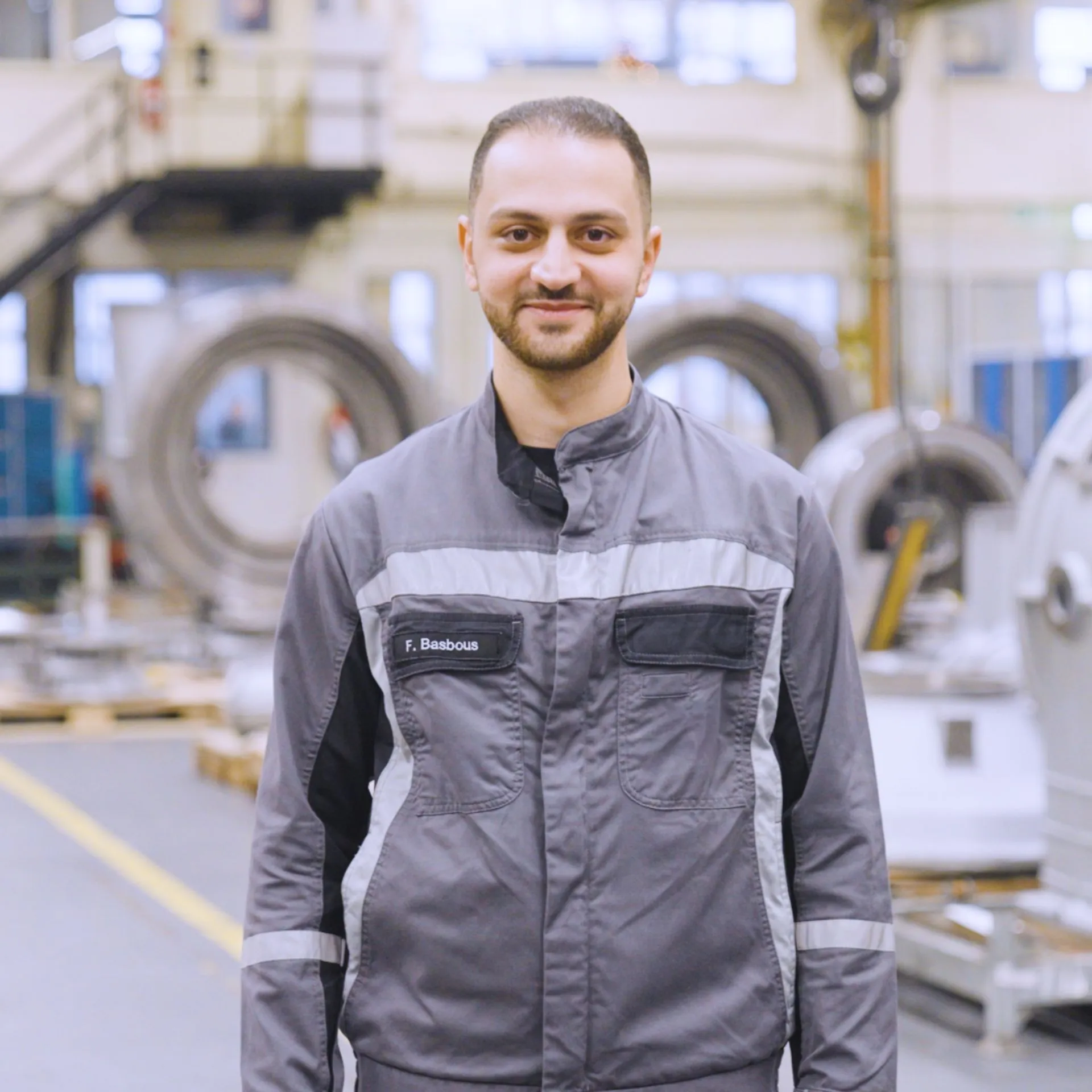Production worker standing in a production hall