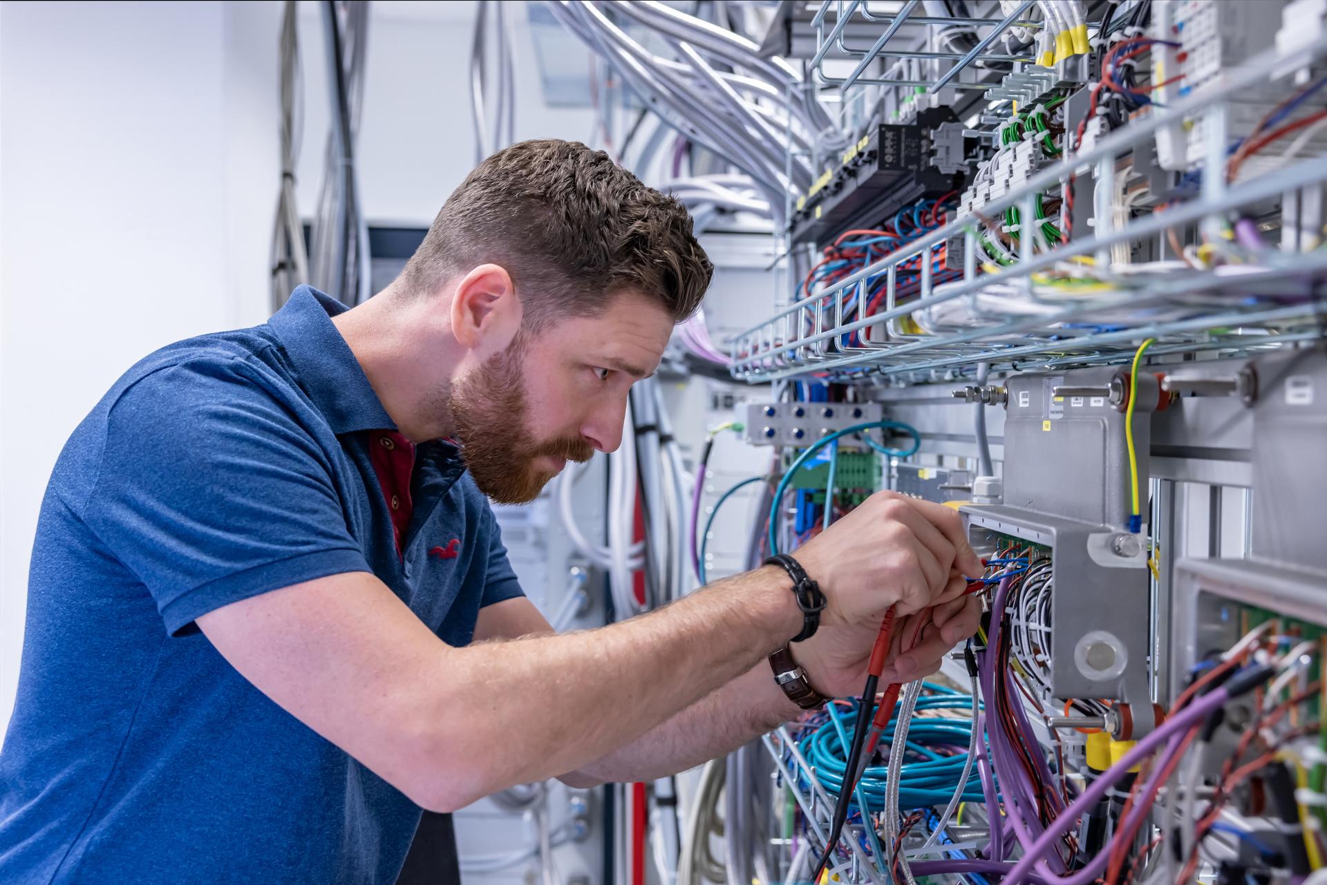 Man working with electronics