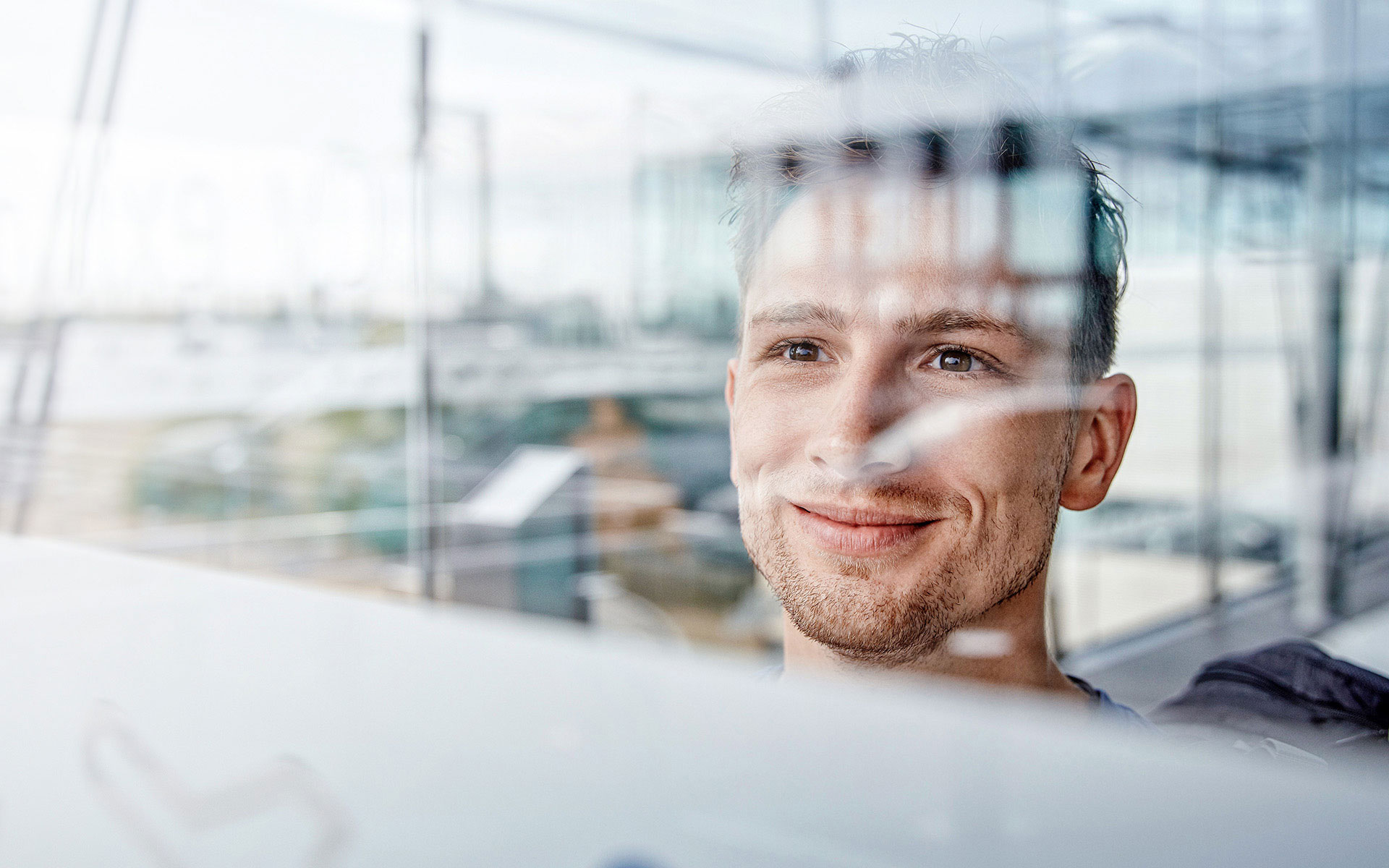 Smiling male trainee, graduate program