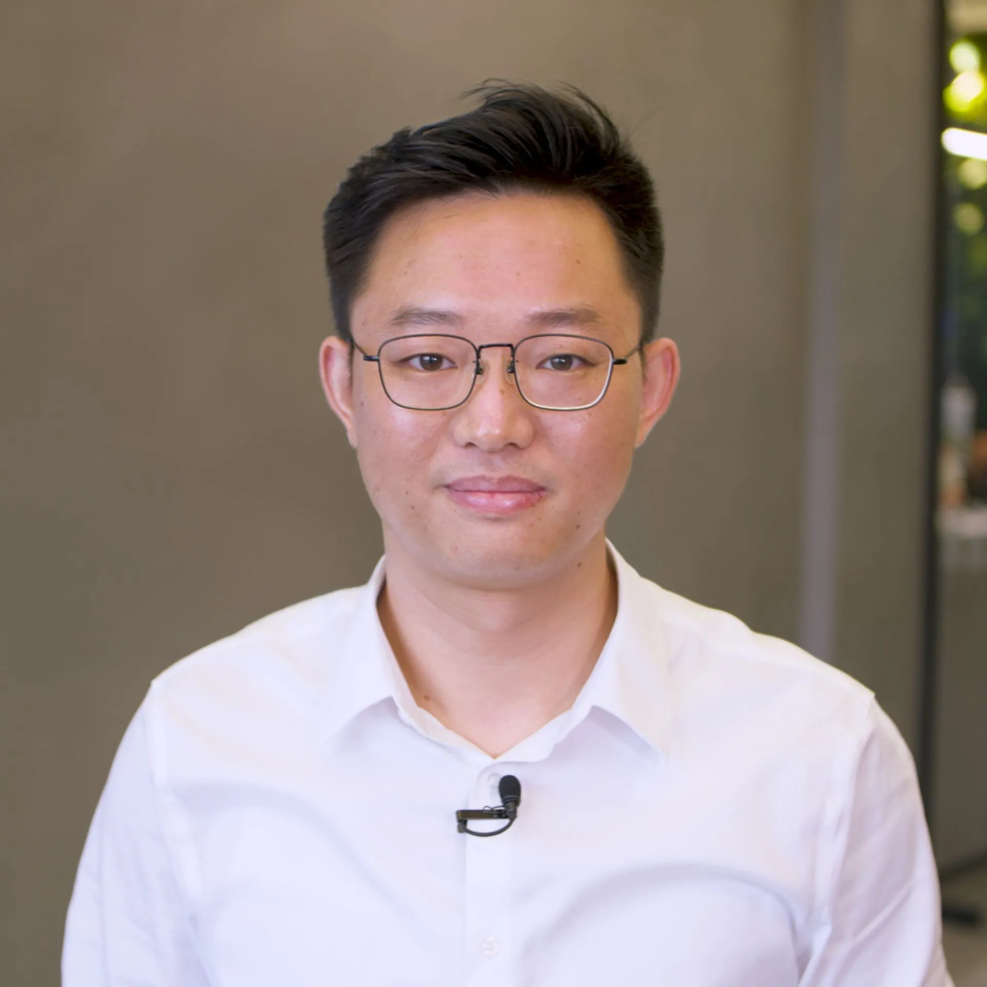 Man with glasses and a shirt