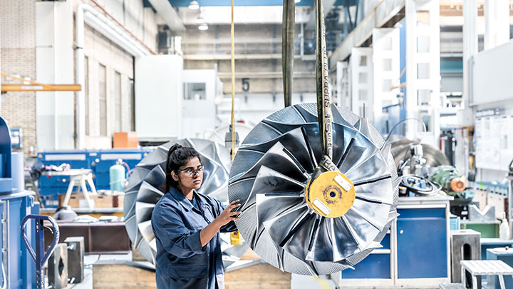 Trainee in compressor production hall