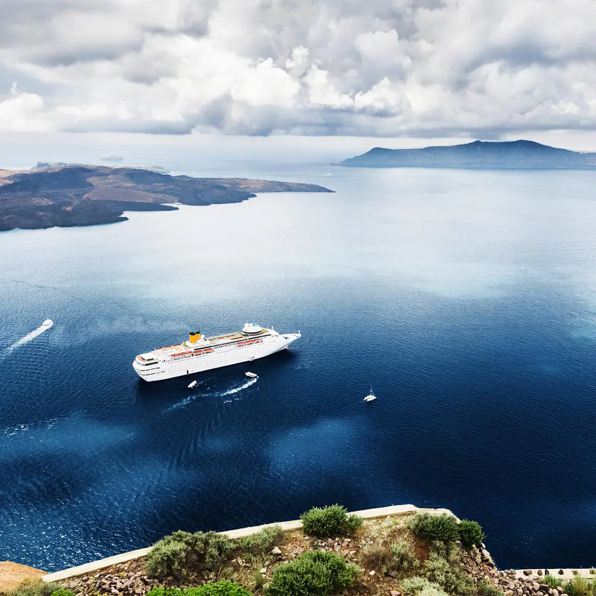 Beautiful landscape with sea view. Cruise liner at the sea near the islands