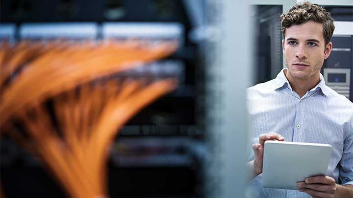 Employee checks screes