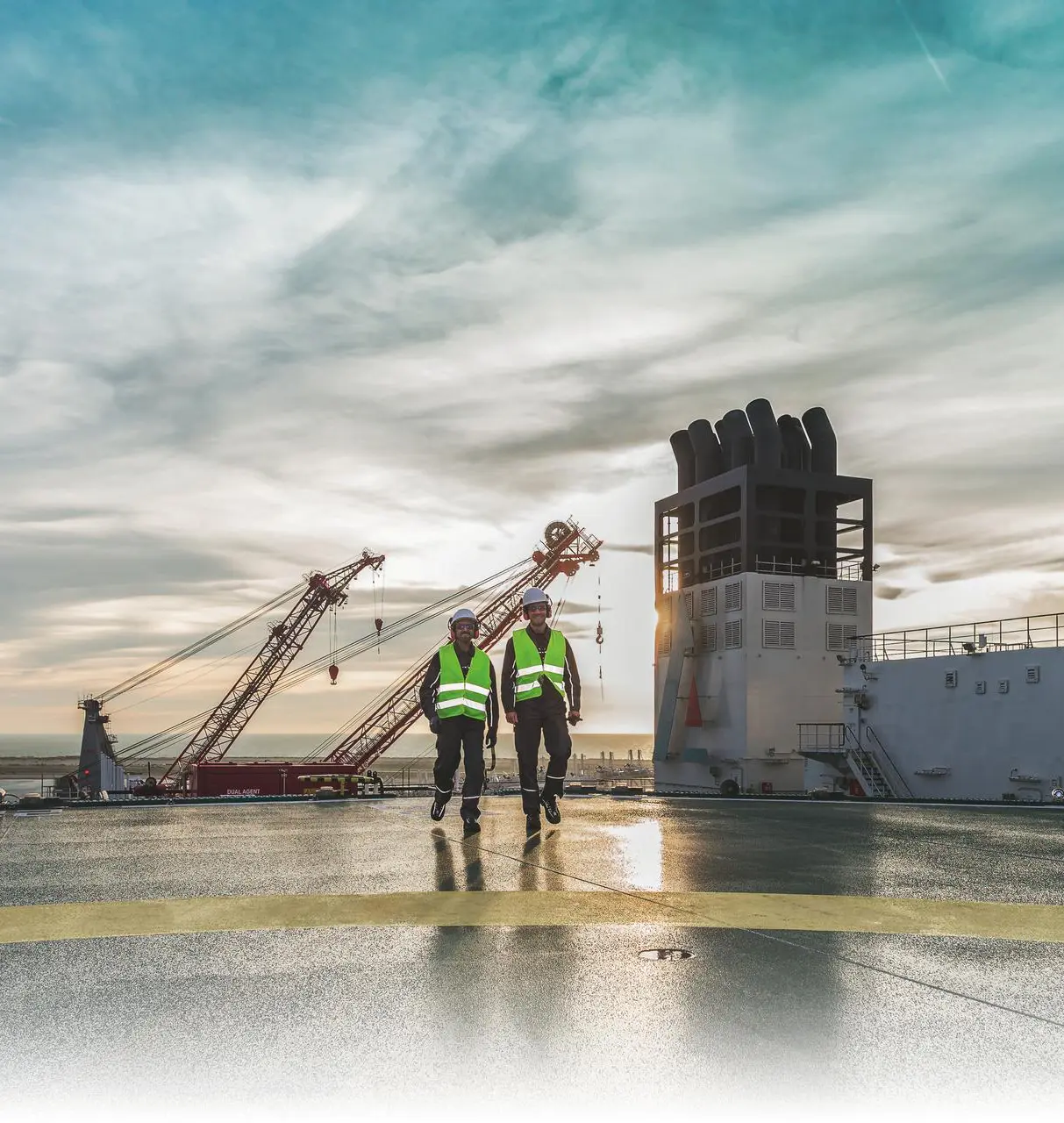two service employees at a harbor