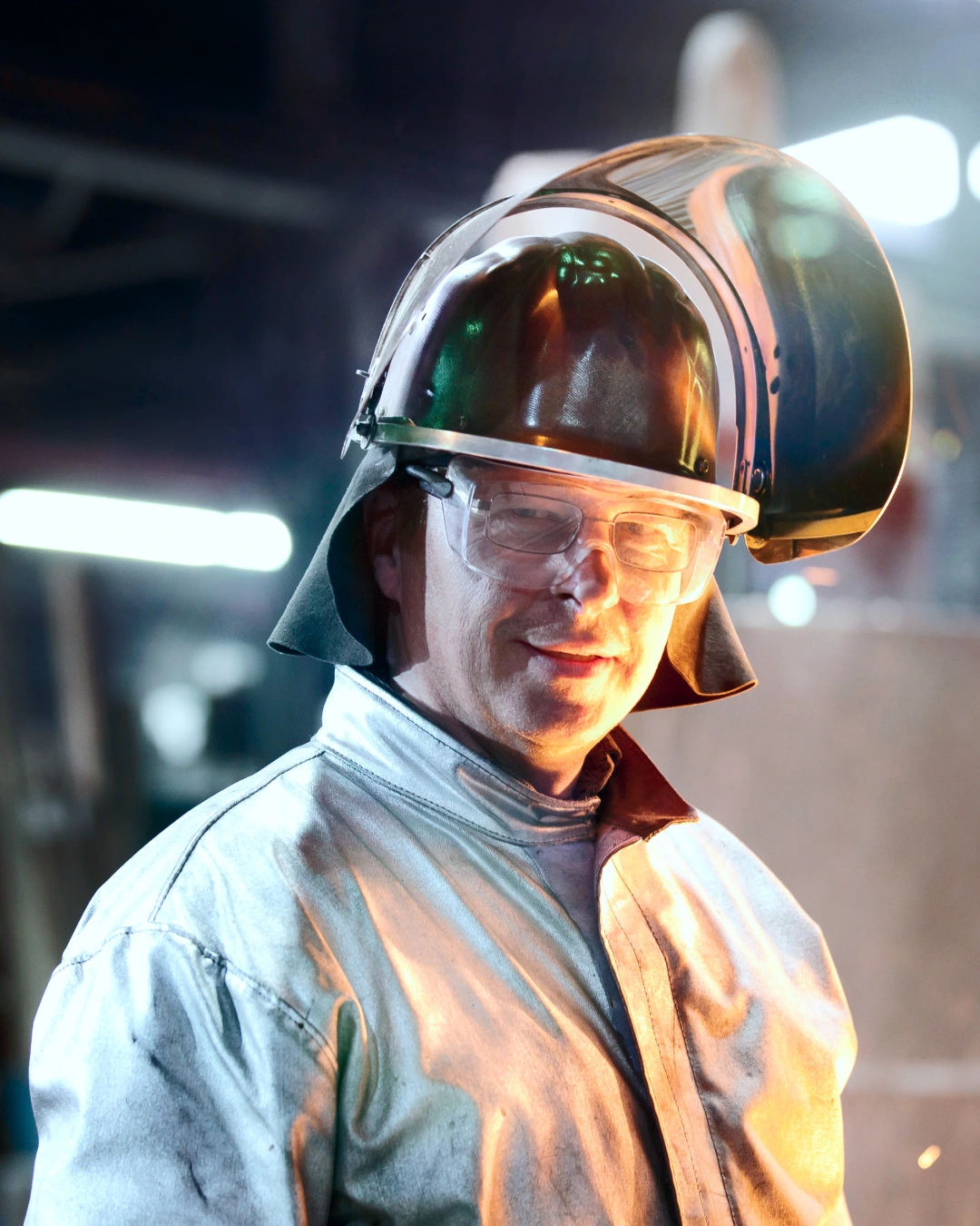 Foundry worker in protective clothing