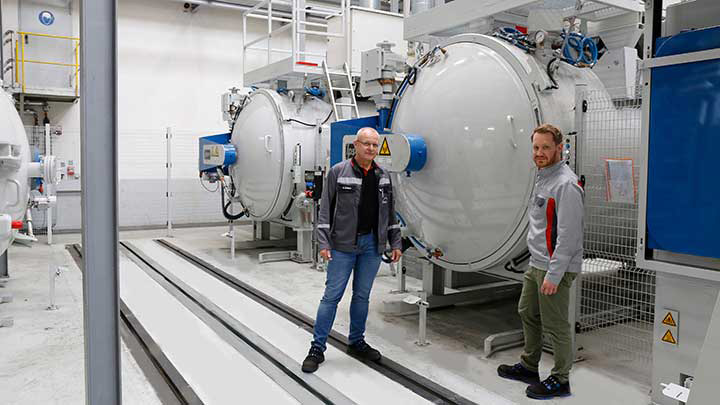 Two employees in the hardening shop