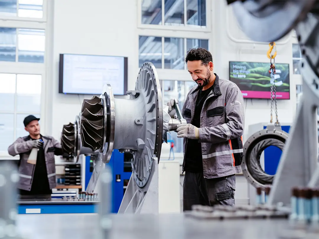 two employees in the turbocharger production