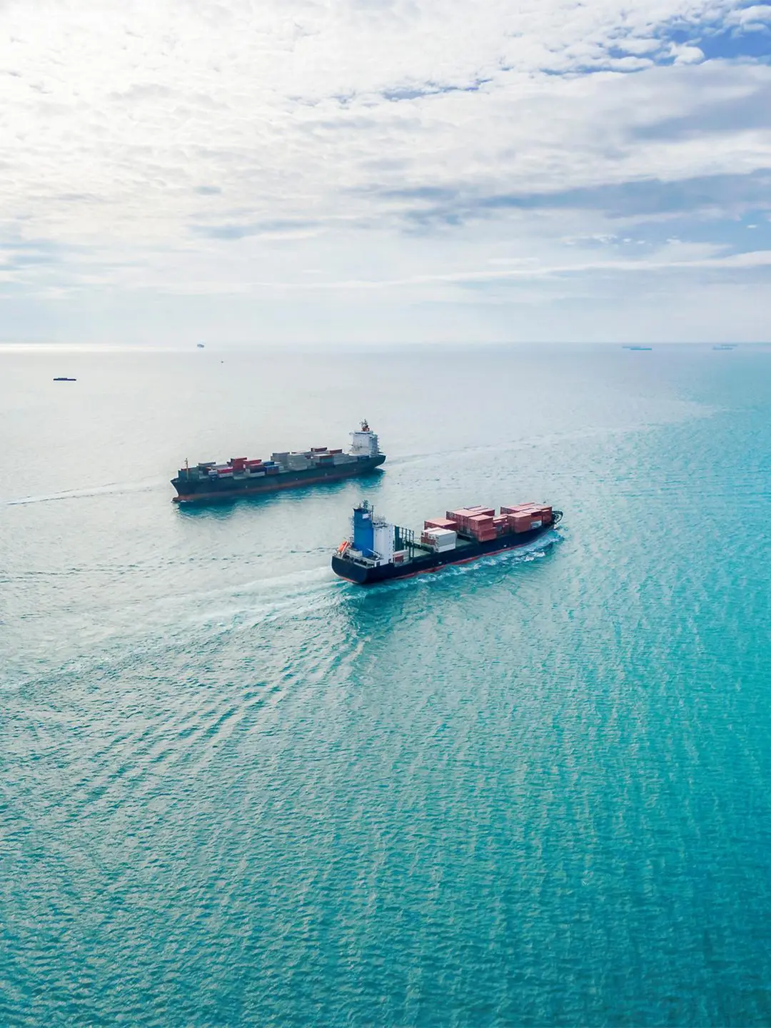 Arial view of two containerships on the ocean