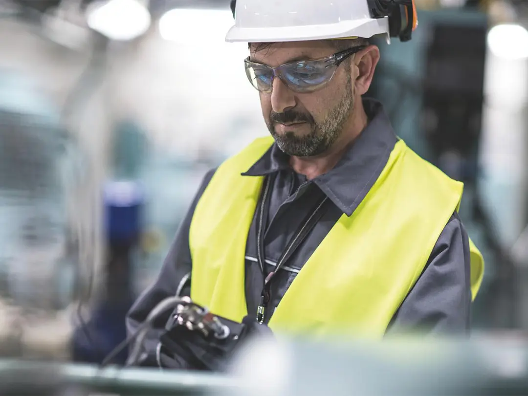service employee inspecting something
