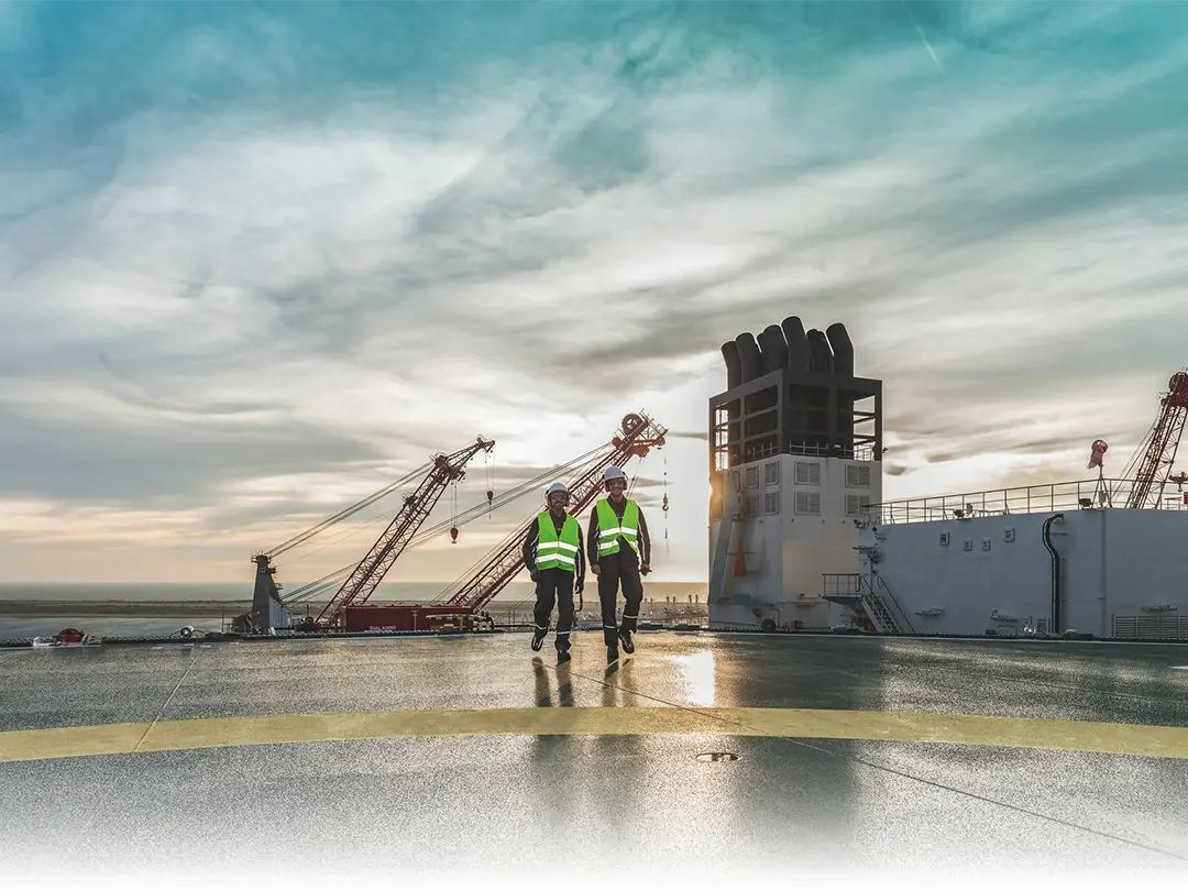 two service employees at a habour