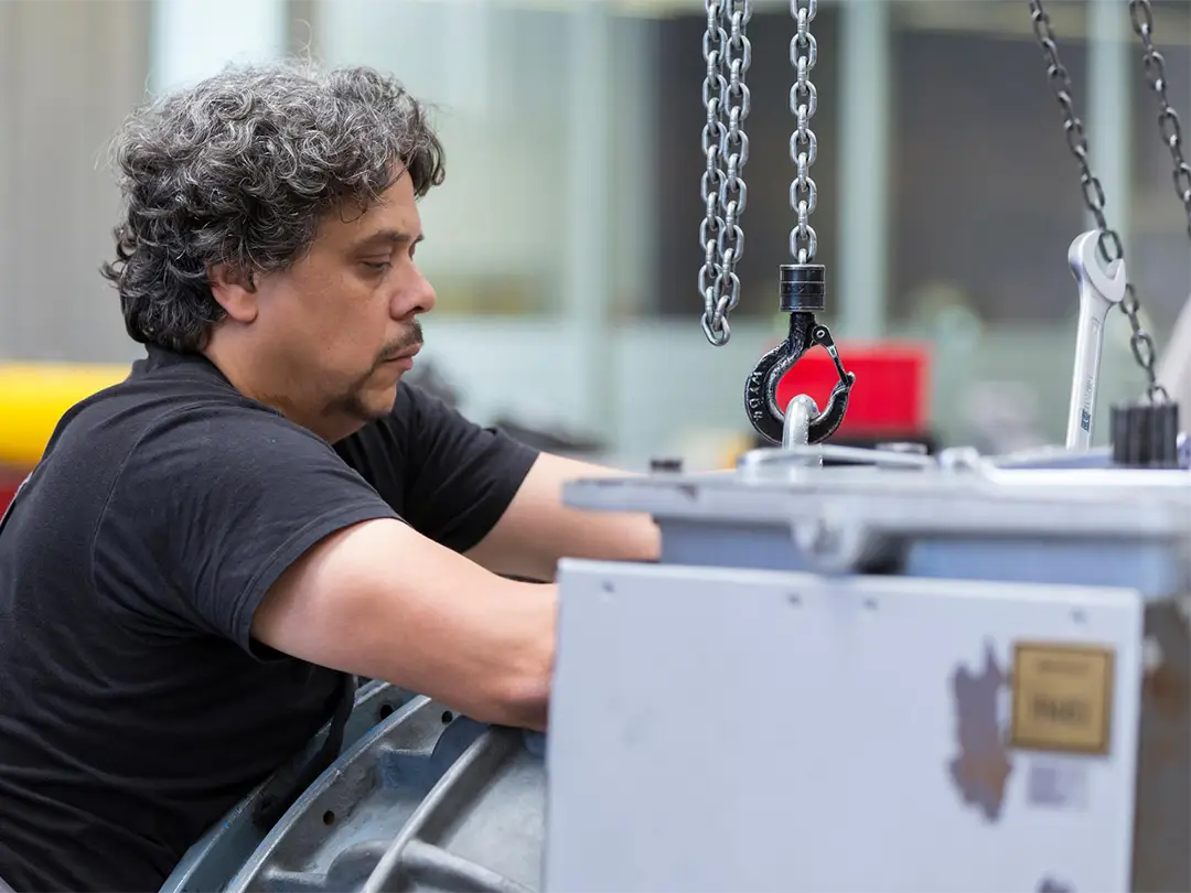 service employee working at a turbocharger