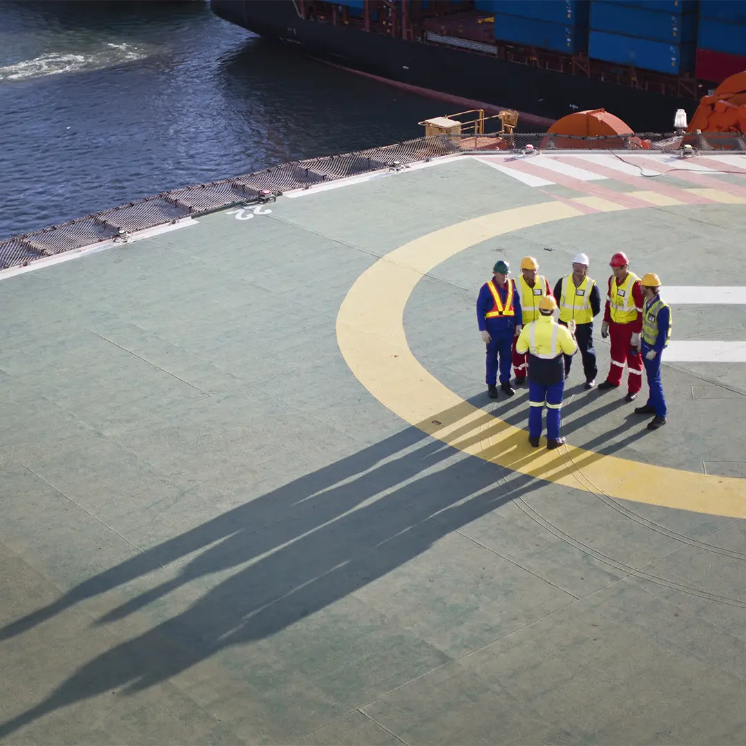 group of service employee at a helicopter landing pad