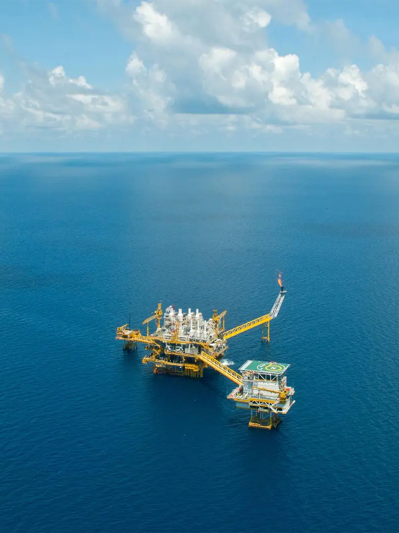 Aerial view of an oil rig in the water