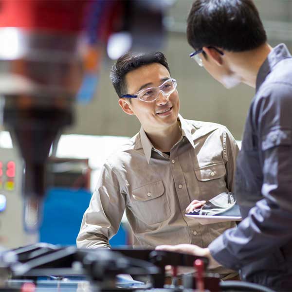 Two employees in production