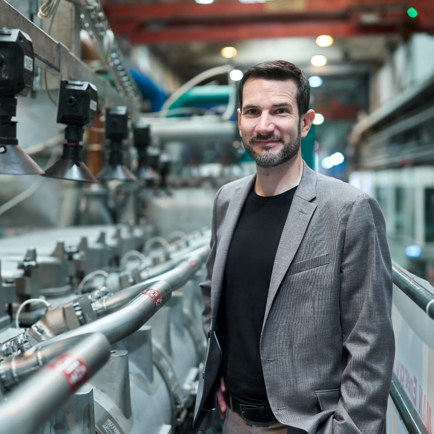 Bernd Siebert next to engine