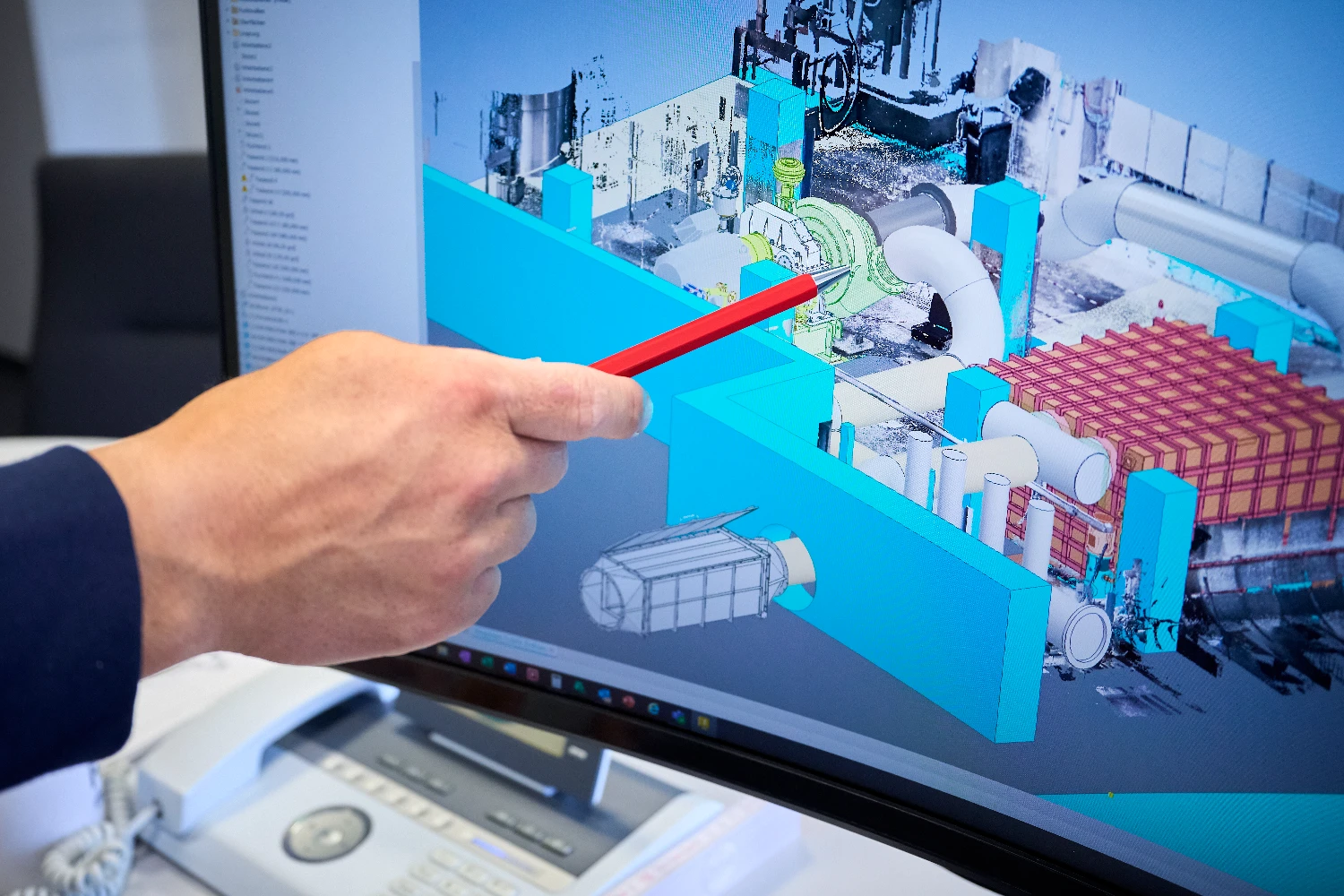 Digital 3D model of a TURBAIR vacuum system displayed on a monitor.