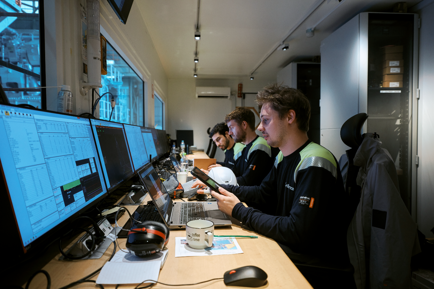 Staff at the control, poring over incoming data informing about the engine's performance.