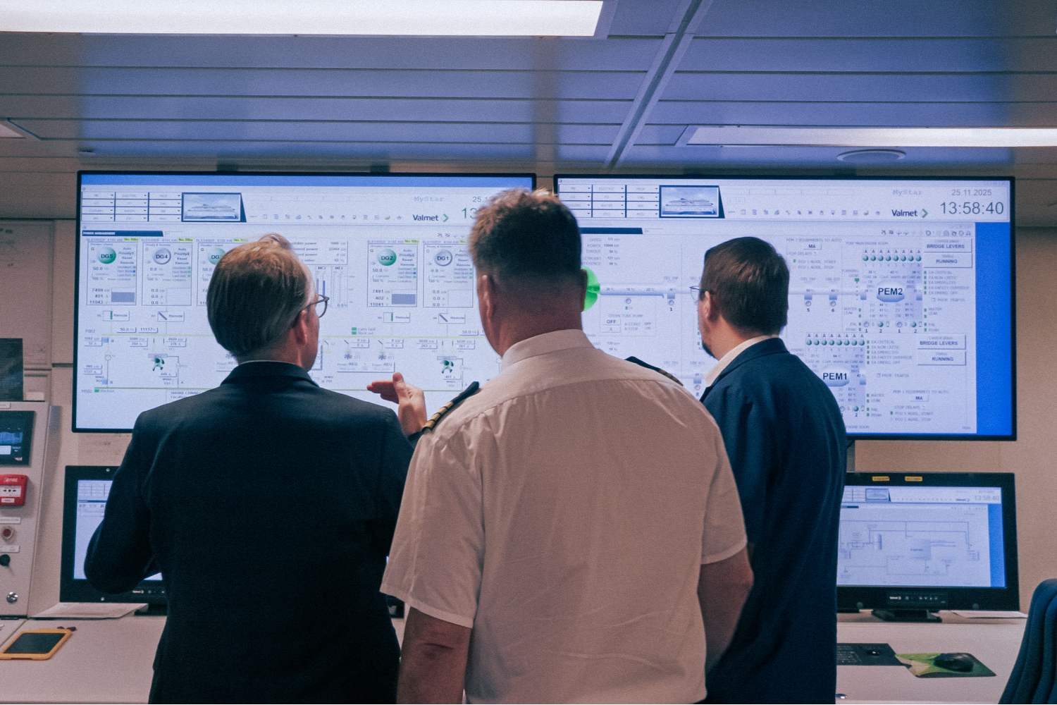 Engineers monitoring ferry engine performance in MyStar’s control room.