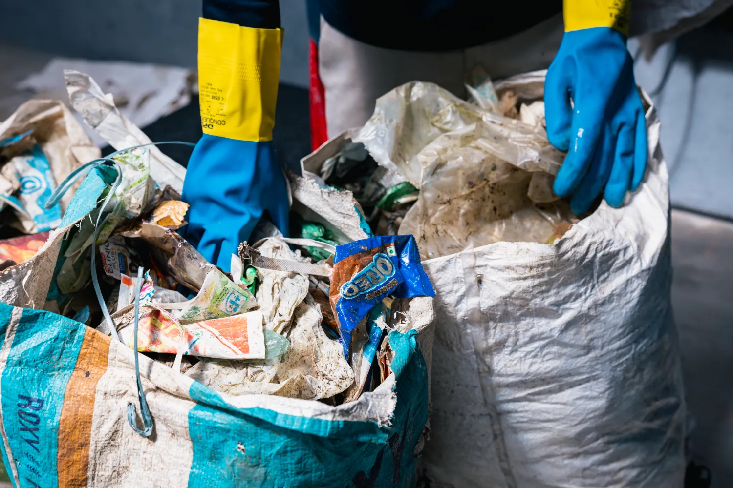 Bags filled with sorted plastic waste at the Material Recovery Facility in Bengaluru, India.