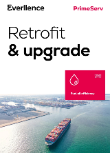 cover image showing an aerial shot of a container ship near a habour