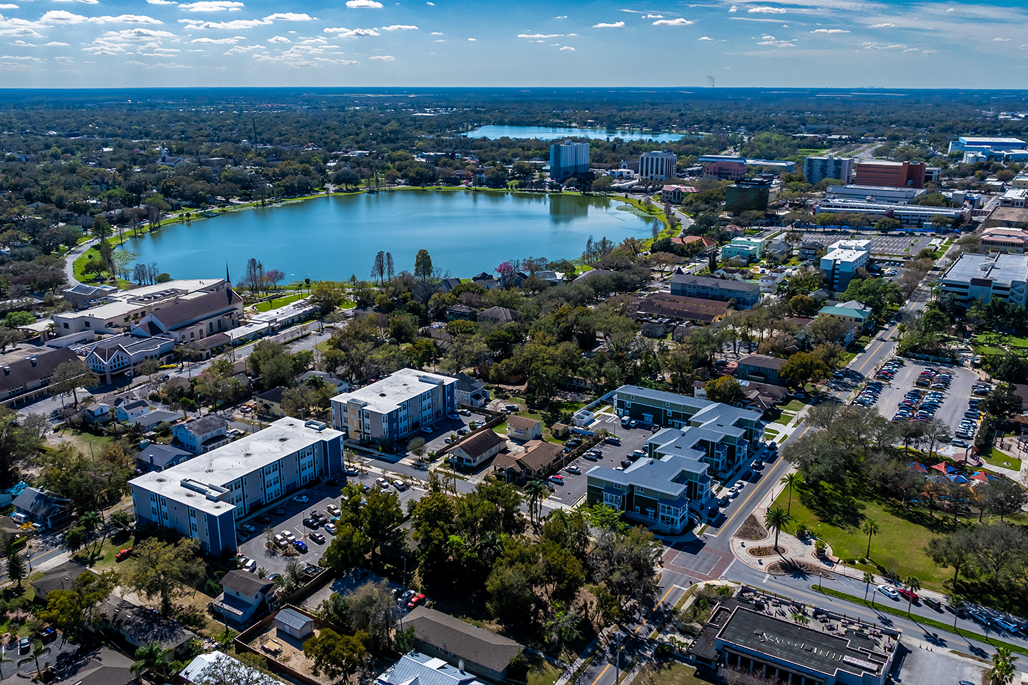 Digital rendering of a power plant with cooling towers and surrounding green space