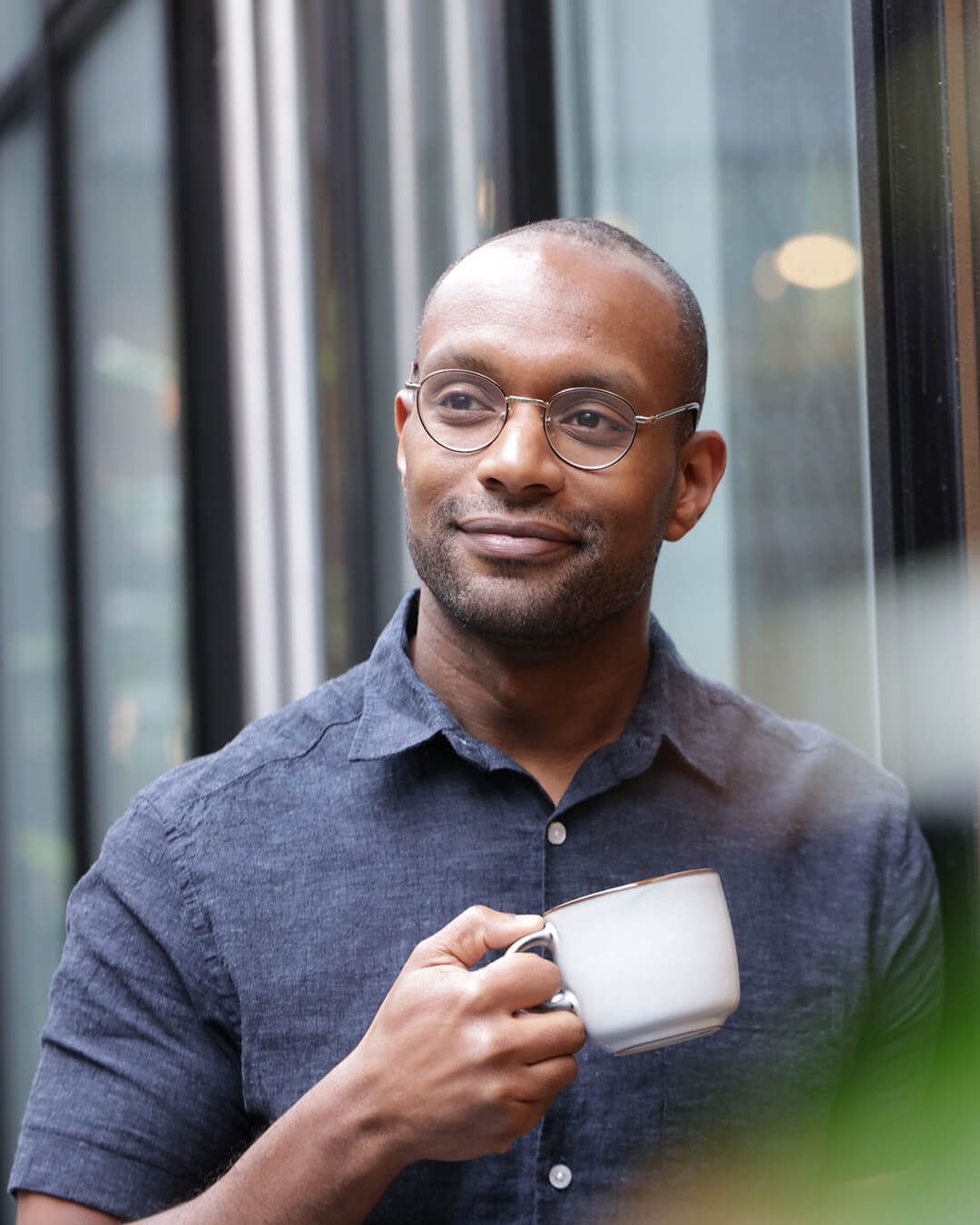 Confident man with coffee mug