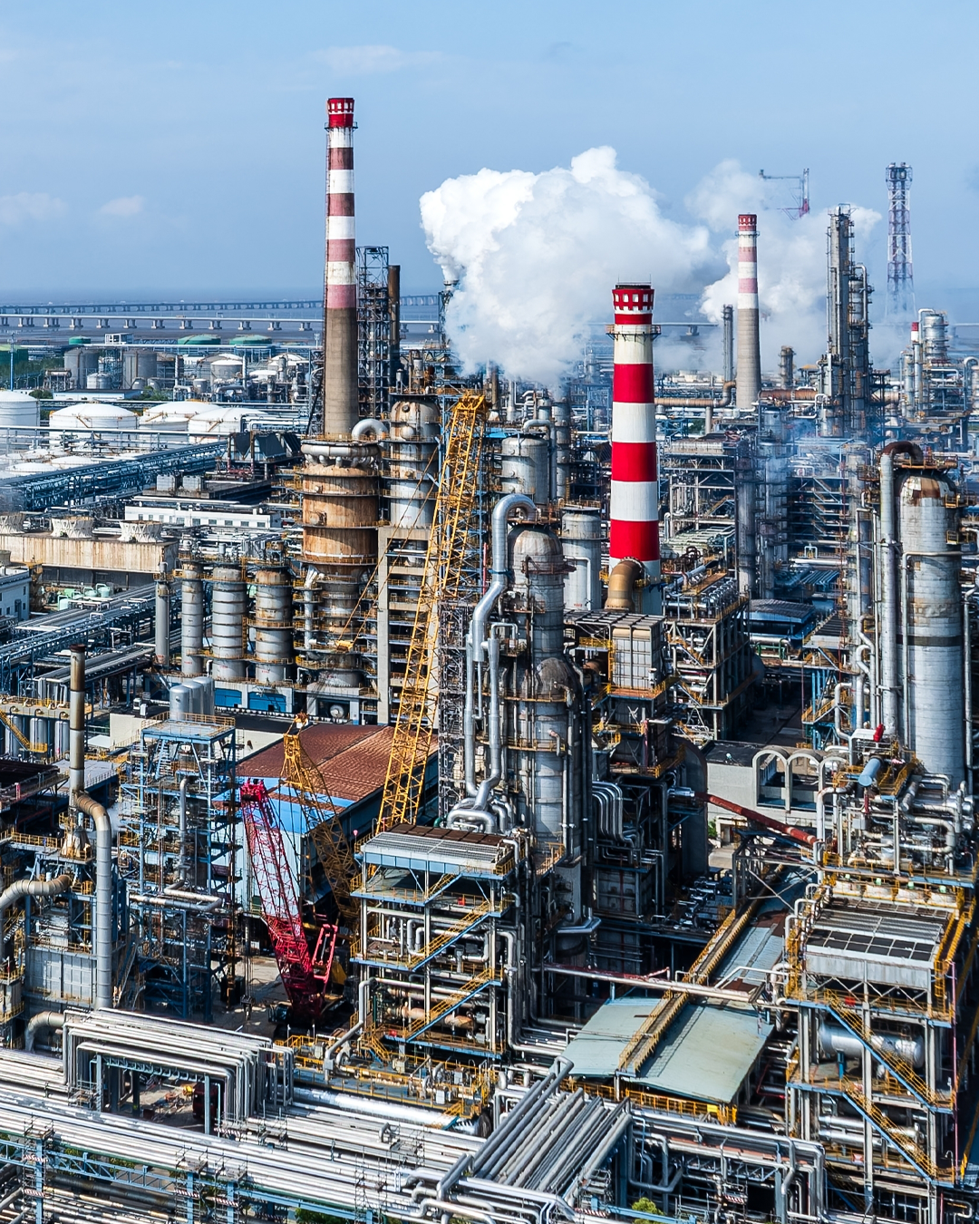 factory with smoking chimneys