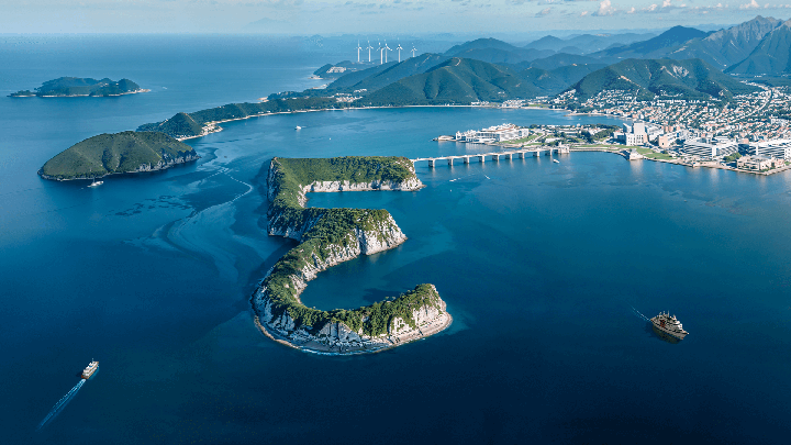 aerial view of island in the form of the Everllence super sign