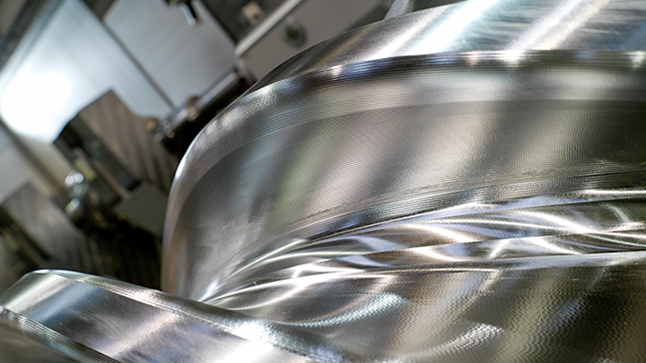 Screw Rotor Detail Close-up of precision-engineered screw rotors with polished metallic surface