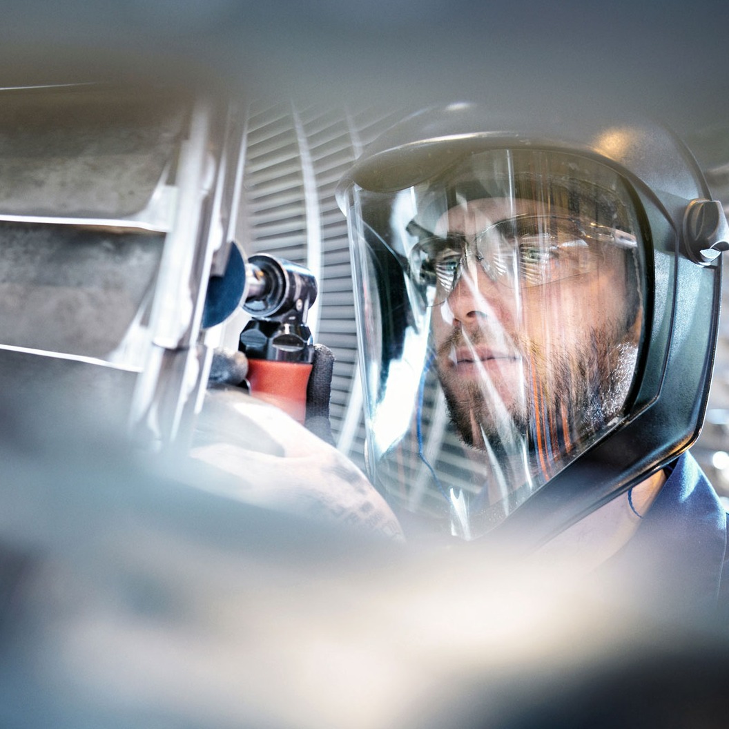 A worker with helmet in a industrial gases sector