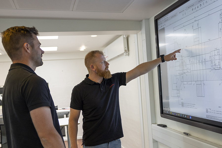 Engineers discussing at industrial facility