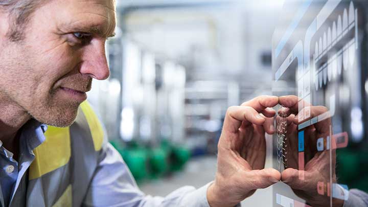 Man watching a machine interface