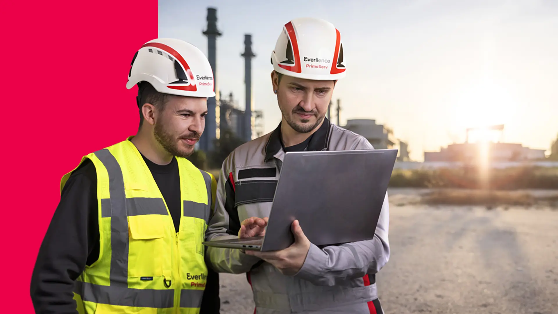 two service employees looking into a notebook