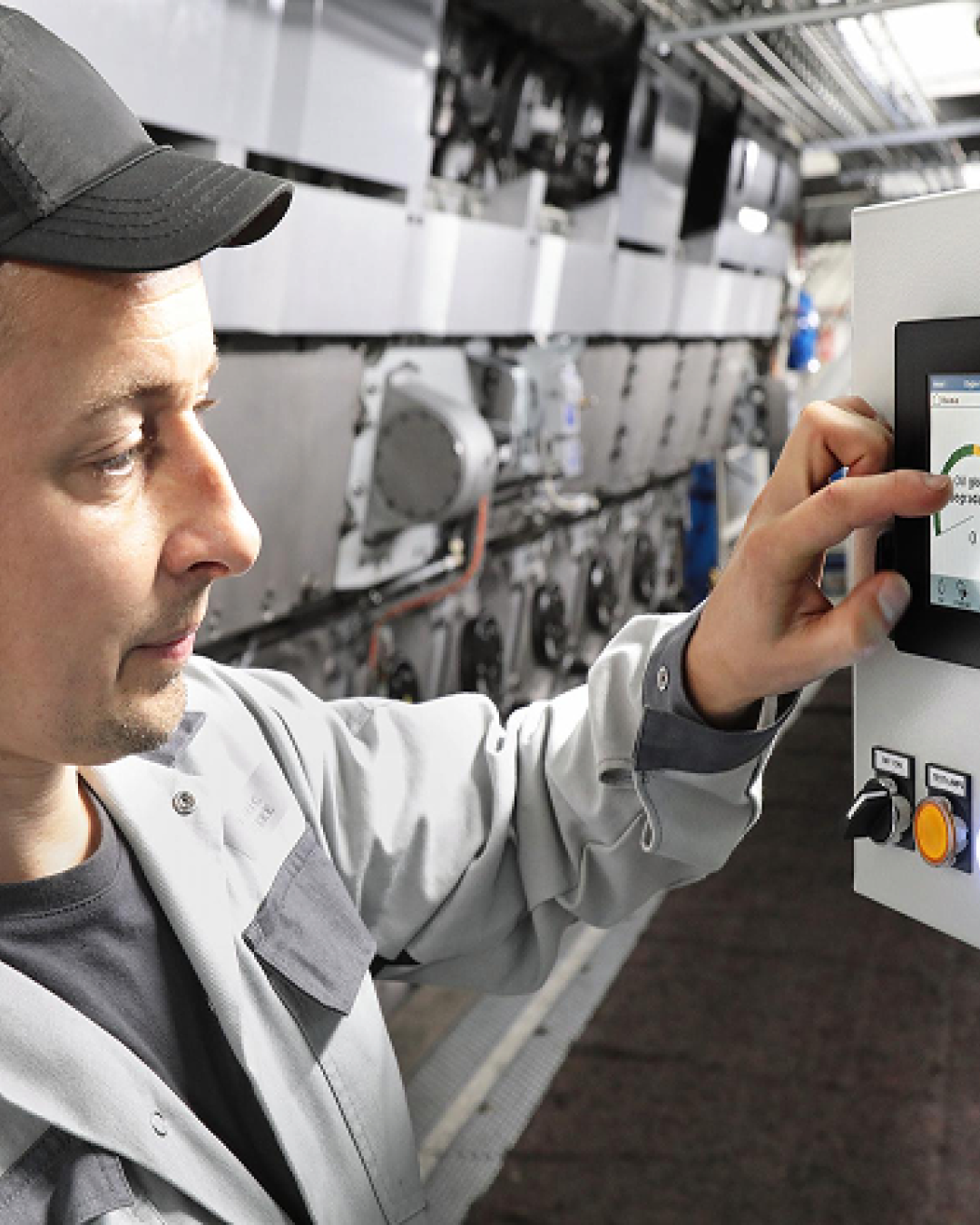 service employee checking a monitor