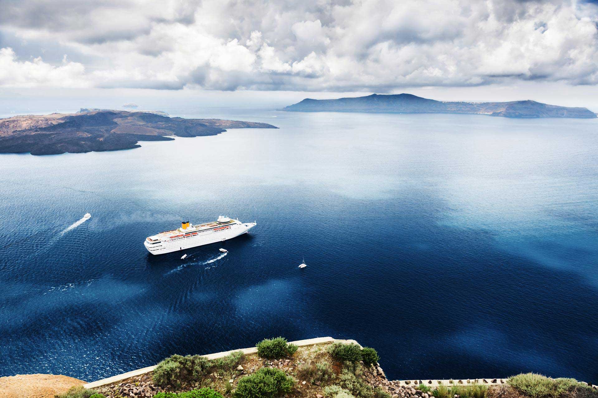 Cruise liner near Santorini islands