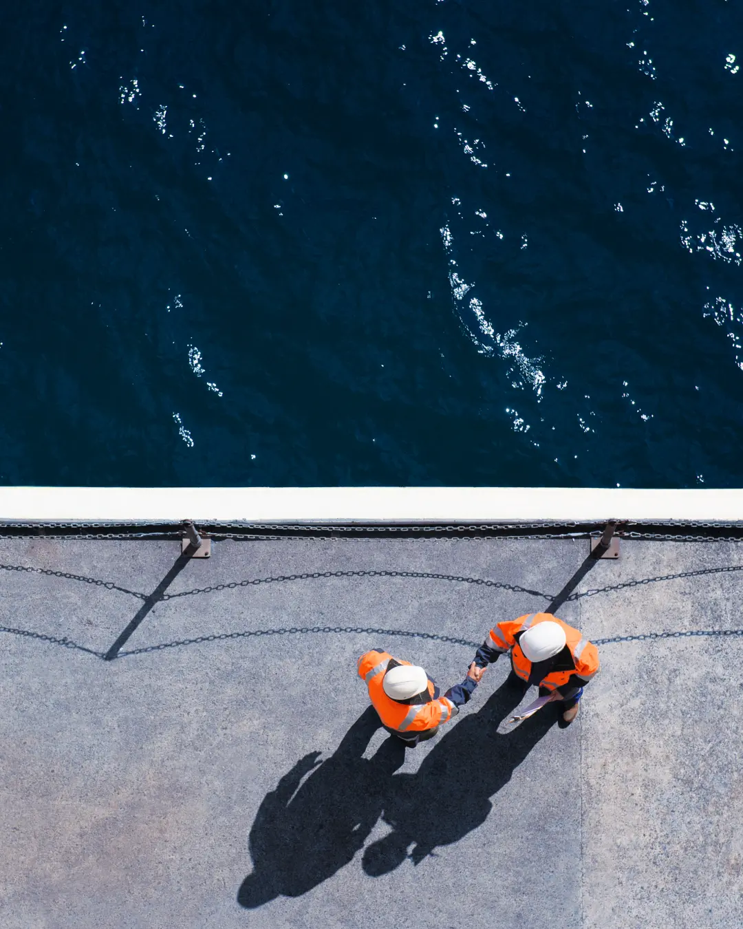 Two service staff members, seen from above