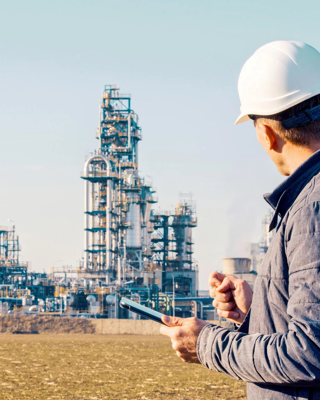 service employee in front of a plant