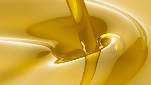 close-up of lube oil beeing poored