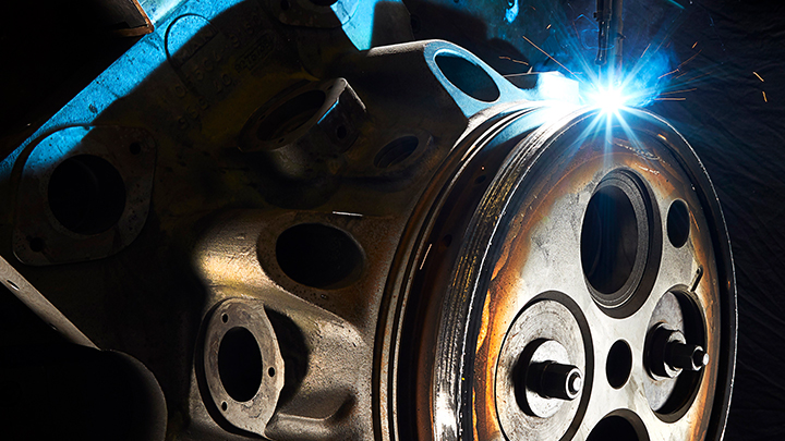detailed view of engine part with welding light